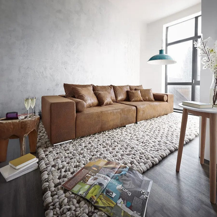 Dumonde kihúzható kanapé tároló rekesszel és kényelmes, nagy sűrűségű habszivacsból készült ülőfelülettel, Marbela Madagaskar barna XXL 295x100 cm